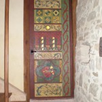 Door with Medievil motifs painted by Christina Bonnett